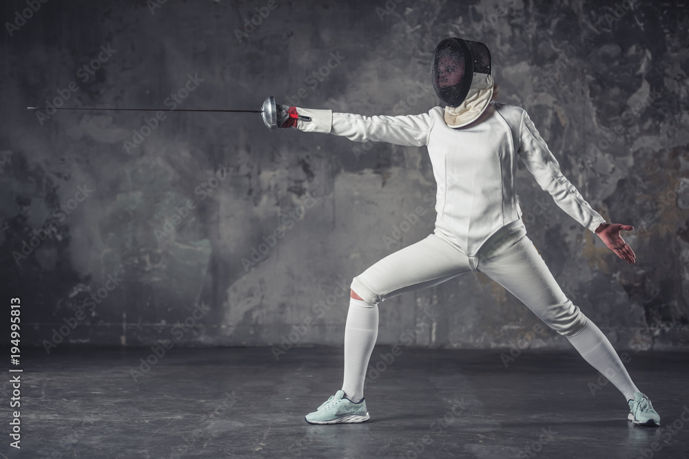 Woman is fencing