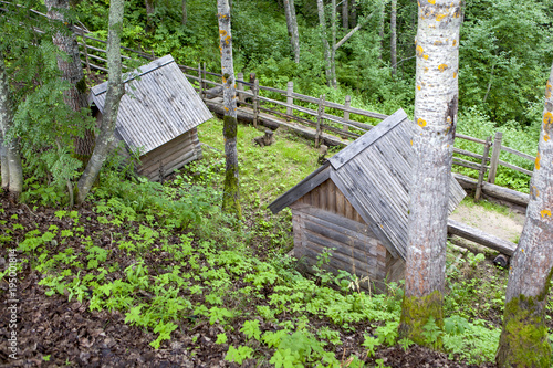 Farm buildings on a hillside. Museum of Wooden Architecture 