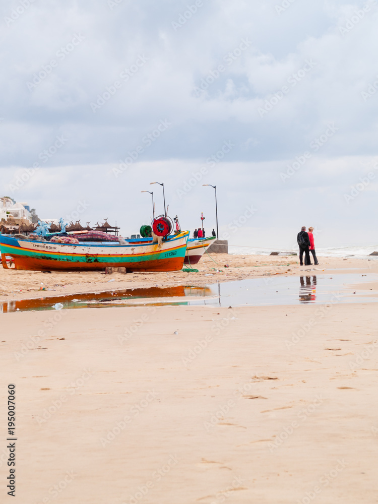 hammamet-Tunisia-city beach with people and boats in the fall