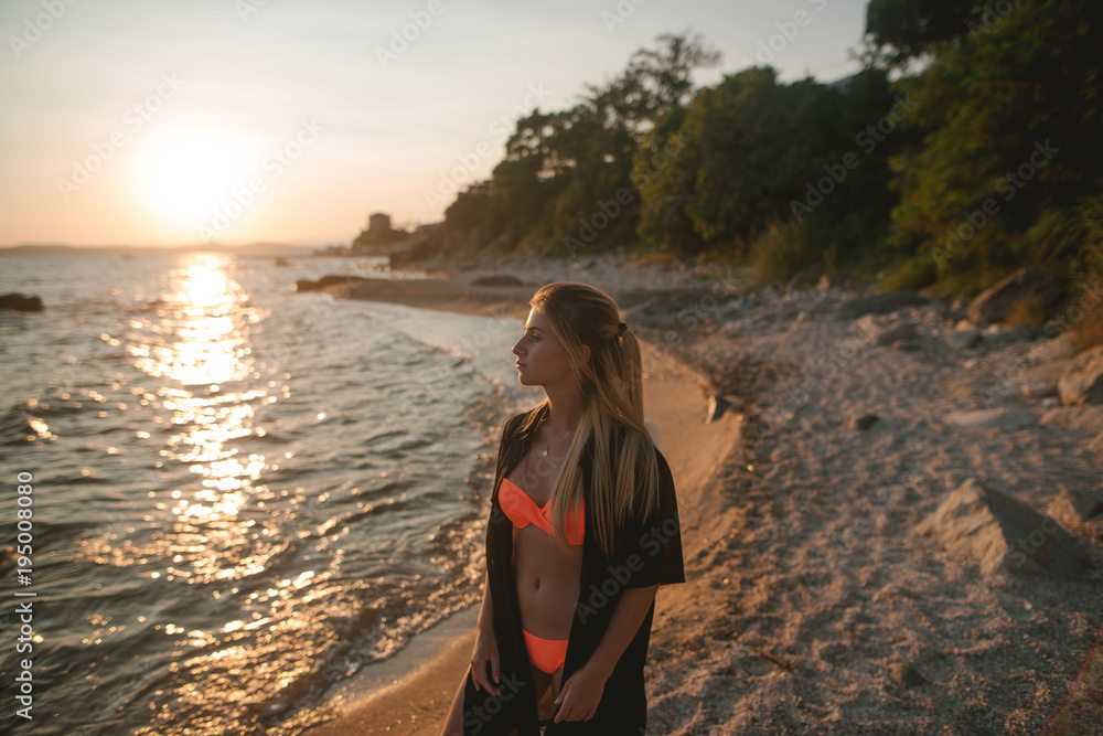Free happy woman enjoying sunset, girl in sportswear,bikini,swimwear
