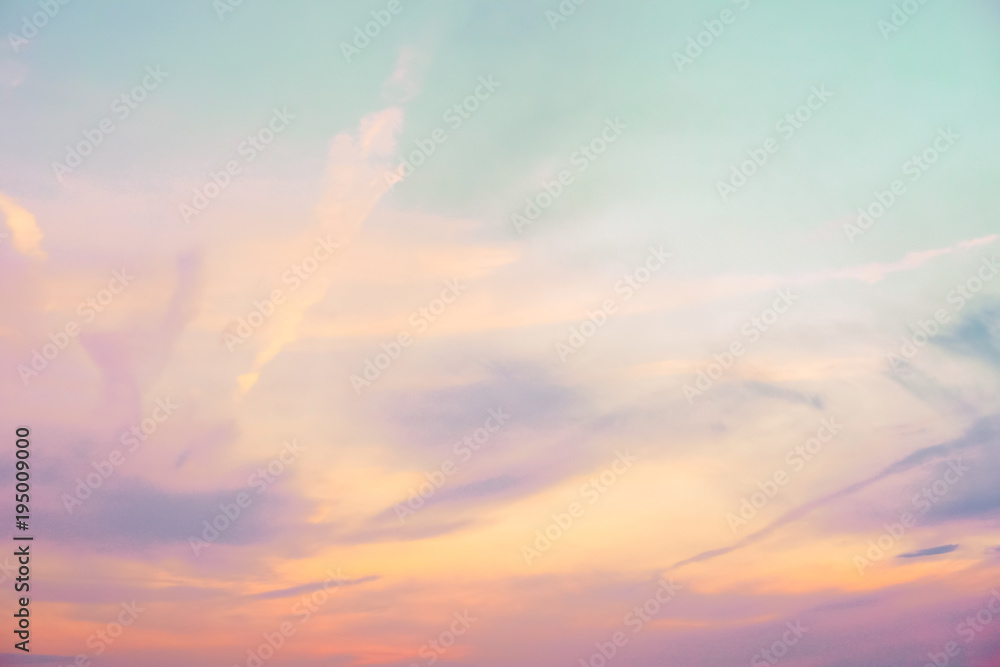pastel colored cloudy sky - orange, purple, blue, and white