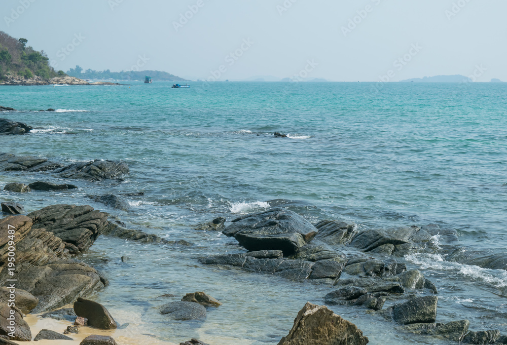 Beautiful landscape of sea and the beach during summer with horizon blue sky