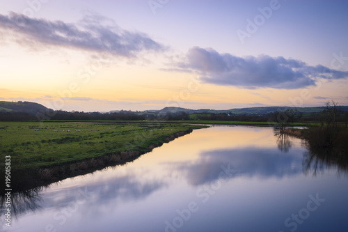 Evening sun over River Towy Carmarthenshire Wales photo
