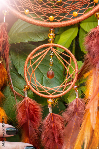 Handmade dream catcher with feathers threads and beads rope hanging