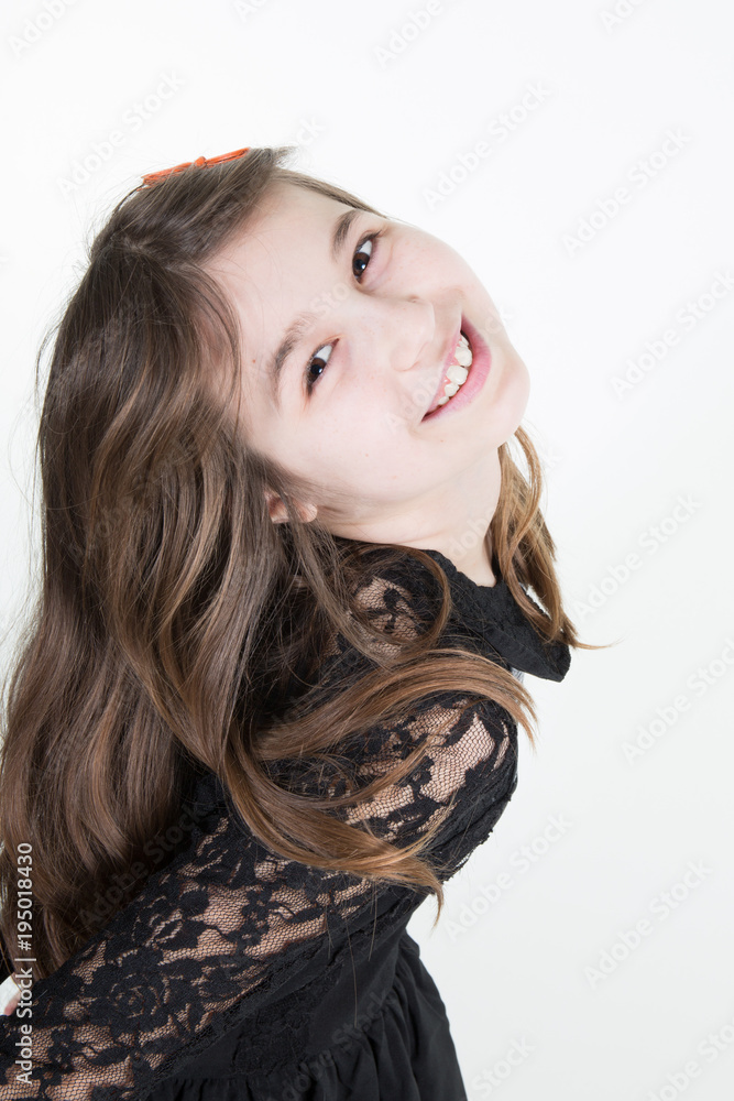 playing young girl teenager in black dress and fashion pose style