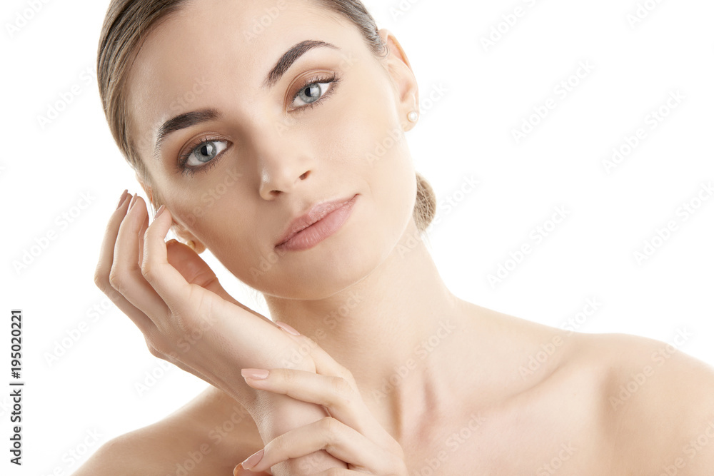 Beautiful young woman with perfect skin. Beauty shot on white background Beautiful young woman with perfect skin. Beauty shot on white background