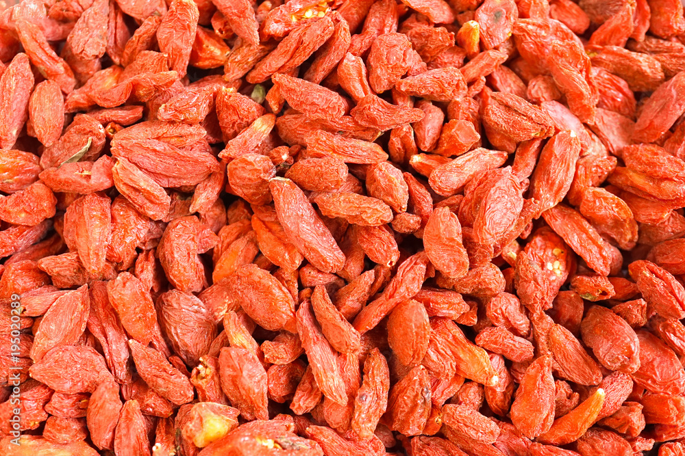 Goji berry. A heap of goji berries isolated on a white background. Goji berry is Chinese herb. It is popular in making soup especially chicken soup. Goji berry. A heap of goji berries isolated on a white background. Goji berry is Chinese herb. It is popular in making soup especially chicken soup.