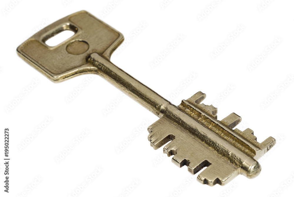 Bronze key on white background closeup