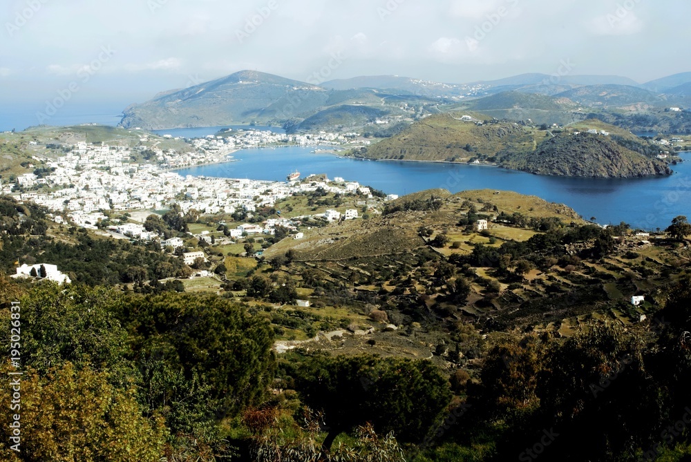 Landscape of Patmos island with the port town of Skala in the background. Patmos, Dodecannese islands, Greece.