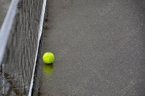 old tennis ball in court