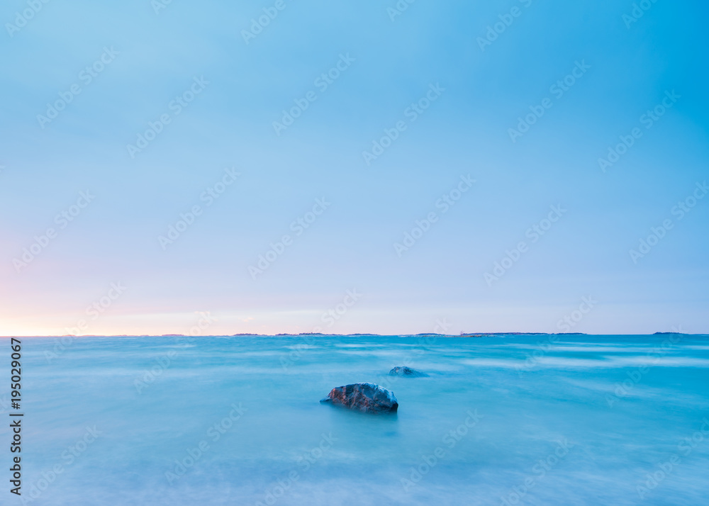 Blue sea around sunset time