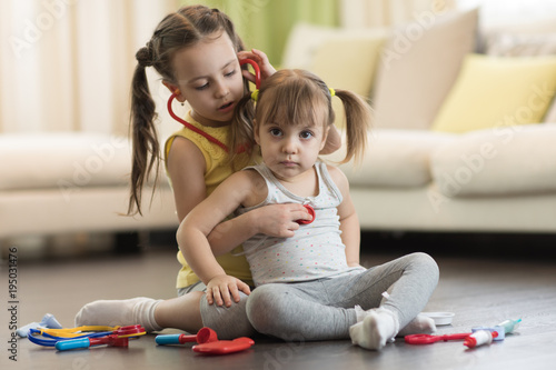 Two preschooler children, c...