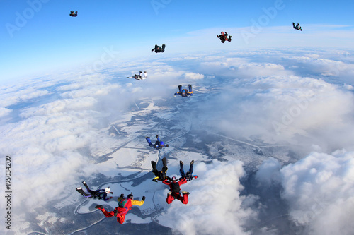 SKydivers in the sky.
