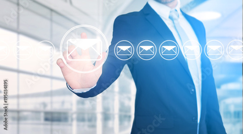 Businessman touching technology interface with professional email icon