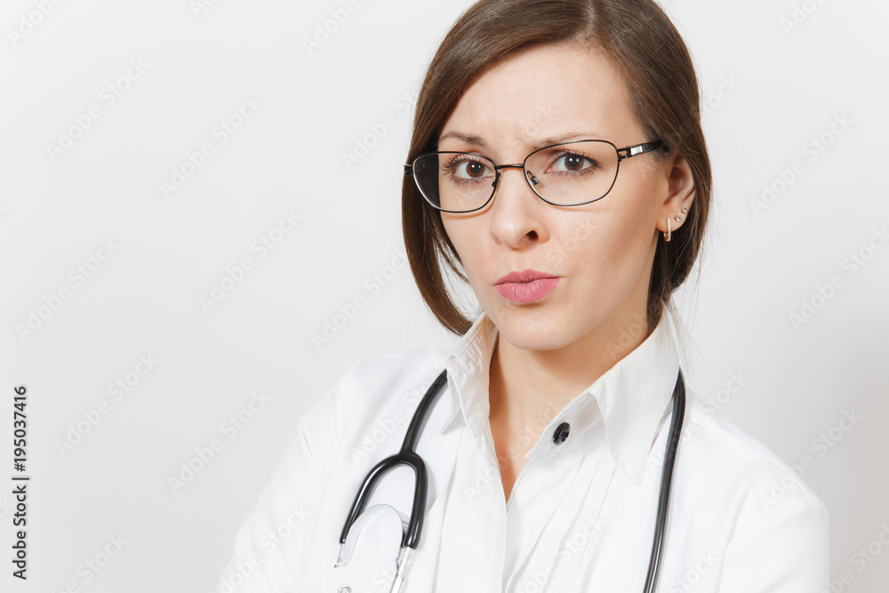 Close up skeptical sad brunette beautiful young doctor woman with stethoscope, glasses isolated on white background. Female doctor in medical gown. Healthcare personnel, health, medicine concept. Close up skeptical sad brunette beautiful young doctor woman with stethoscope, glasses isolated on white background. Female doctor in medical gown. Healthcare personnel, health, medicine concept.