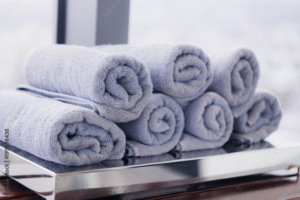 close-up twisted towels on the shelf. Shallow focus close-up twisted towels on the shelf. Shallow focus