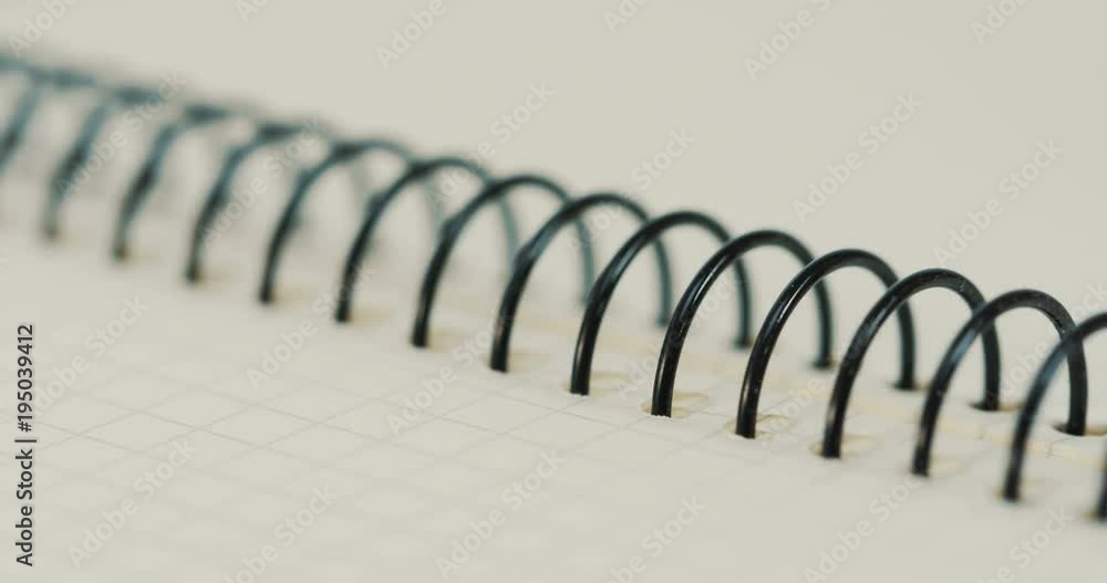 Macro shooting of the blank copybook and its pages being flipped. Close up Macro shooting of the blank copybook and its pages being flipped. Close up