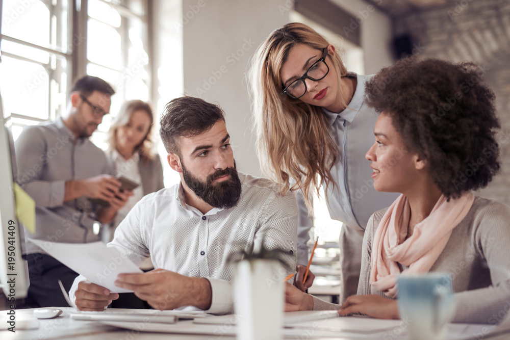 Group of architects working together on project. Group of architects working together on project.