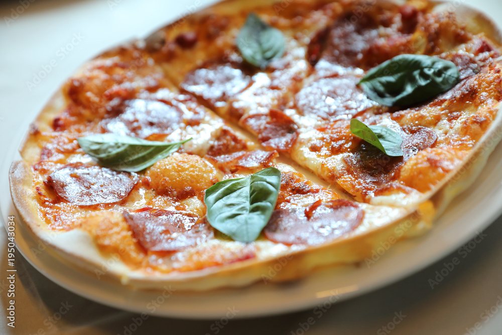 Hot Pepperoni Pizza in dish , Italian food Hot Pepperoni Pizza in dish , Italian food