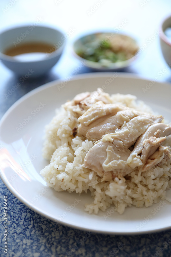 Hainanese chicken rice with cucumber in closeup , Thai food Hainanese chicken rice with cucumber in closeup , Thai food