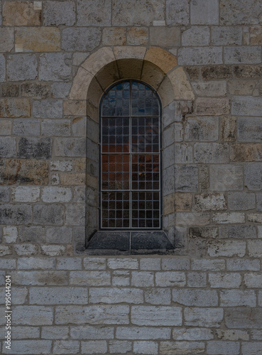 The old and ancient window in stone wall © wlad074