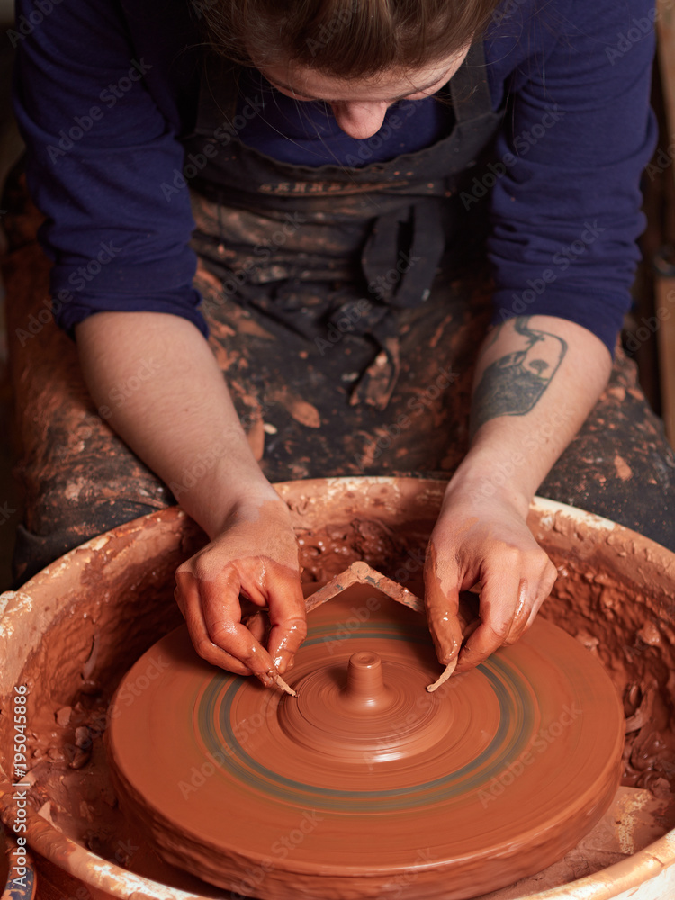 production process of pottery. Checking the Circle with a Caliper.