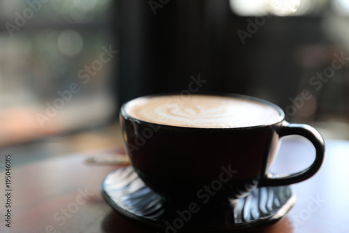 Cappuccino coffee break on wood background