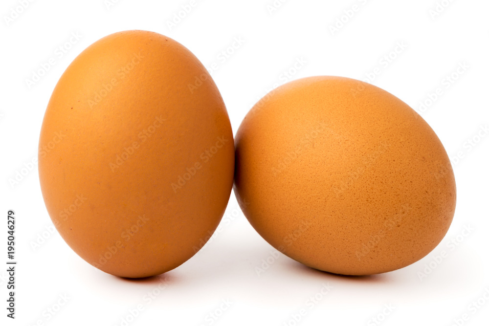 Two chicken eggs on a white Two chicken eggs on a white