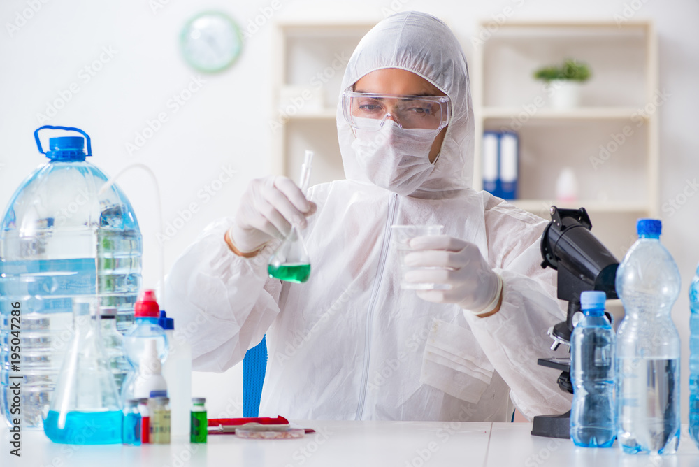 Lab assistant testing water quality Lab assistant testing water quality