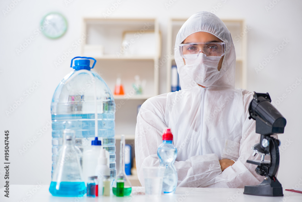 Fototapeta premium Lab assistant testing water quality