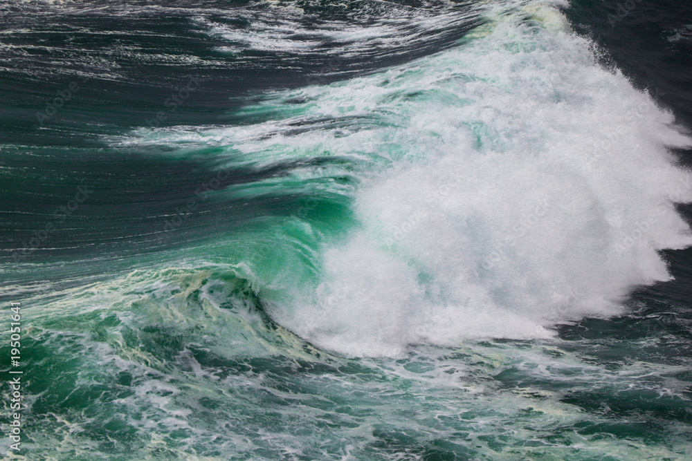 Ocean storm with with big windy waves. Background shot of clear sea water surface Ocean storm with with big windy waves. Background shot of clear sea water surface