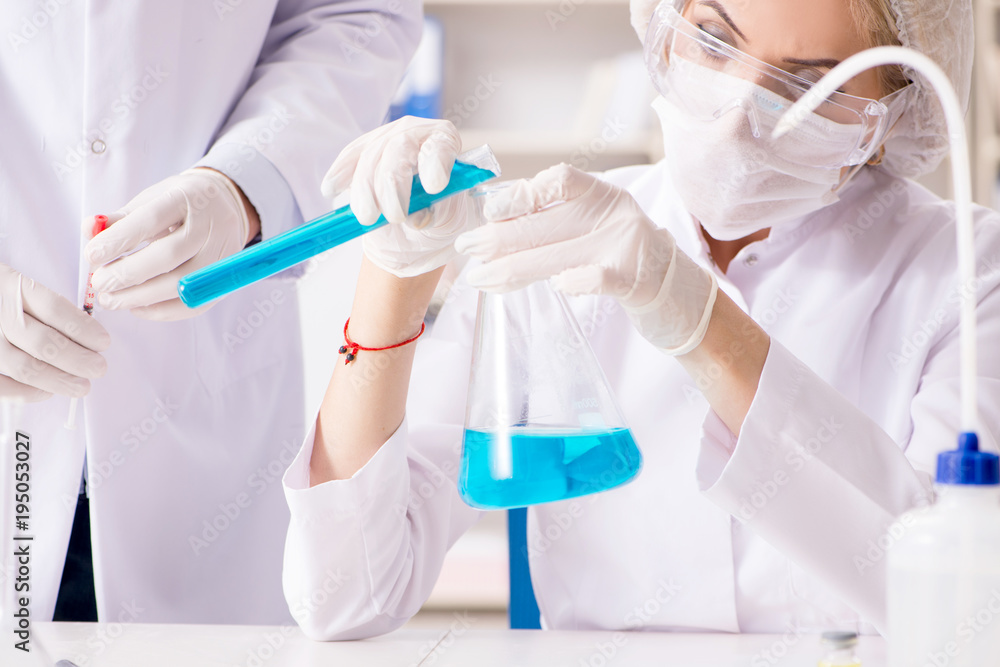Young female woman doctor in hospital clinic lab Young female woman doctor in hospital clinic lab