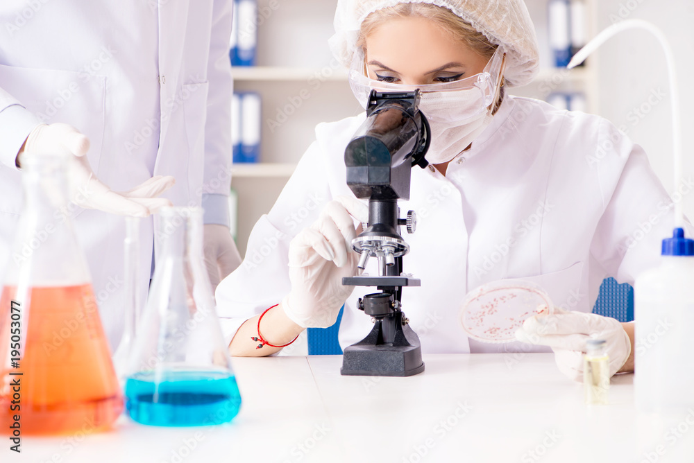 Young female woman doctor in hospital clinic lab Young female woman doctor in hospital clinic lab