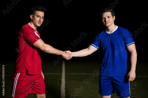 Captains shaking hands before soccer match