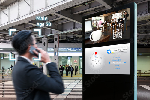 Intelligent Digital Signage , Augmented reality marketing and face recognition concept. Interactive artificial intelligence digital advertisement navigator direction for retail coffee shop. photo