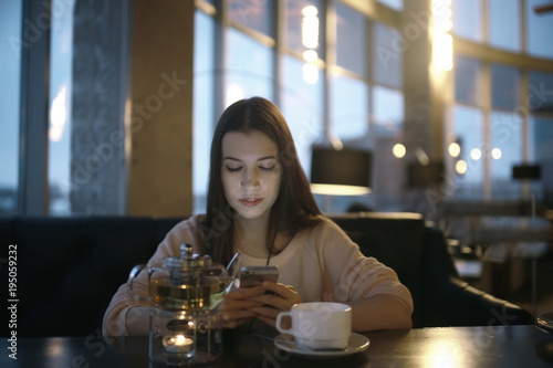 young girl chatting on the phone Internet Addiction Disorder