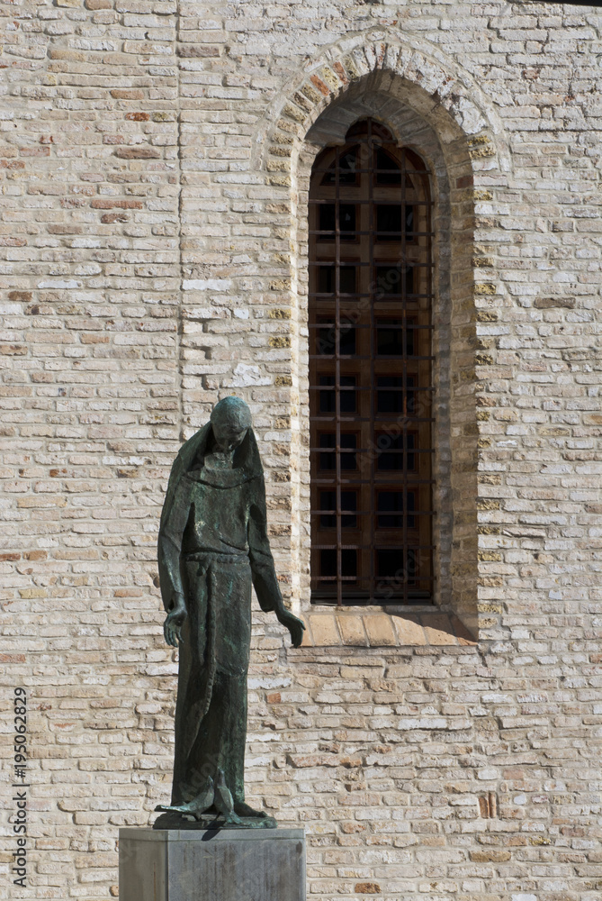 The statue representing St. Francis adjacent to the former convent.Pordenone. italy