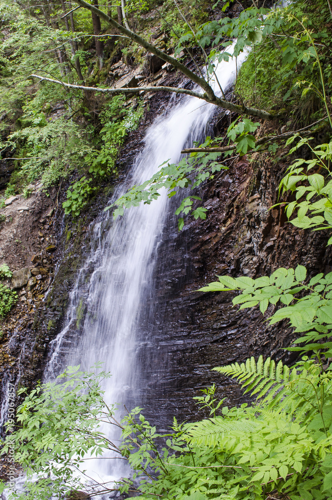small, beautiful waterfall in the Carpathians small, beautiful waterfall in the Carpathians