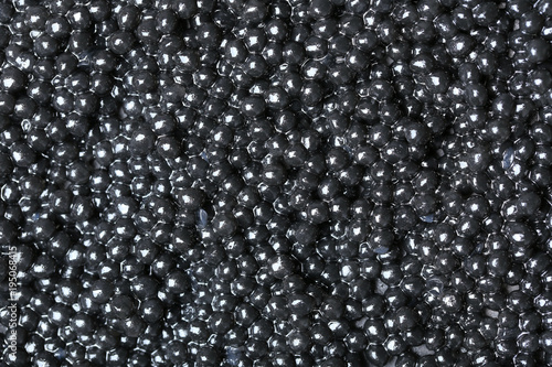 Delicious black caviar as background