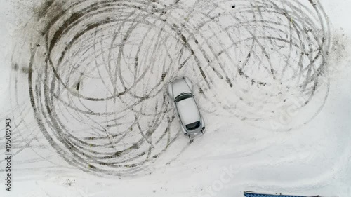 Car is making a drift in the snow photo