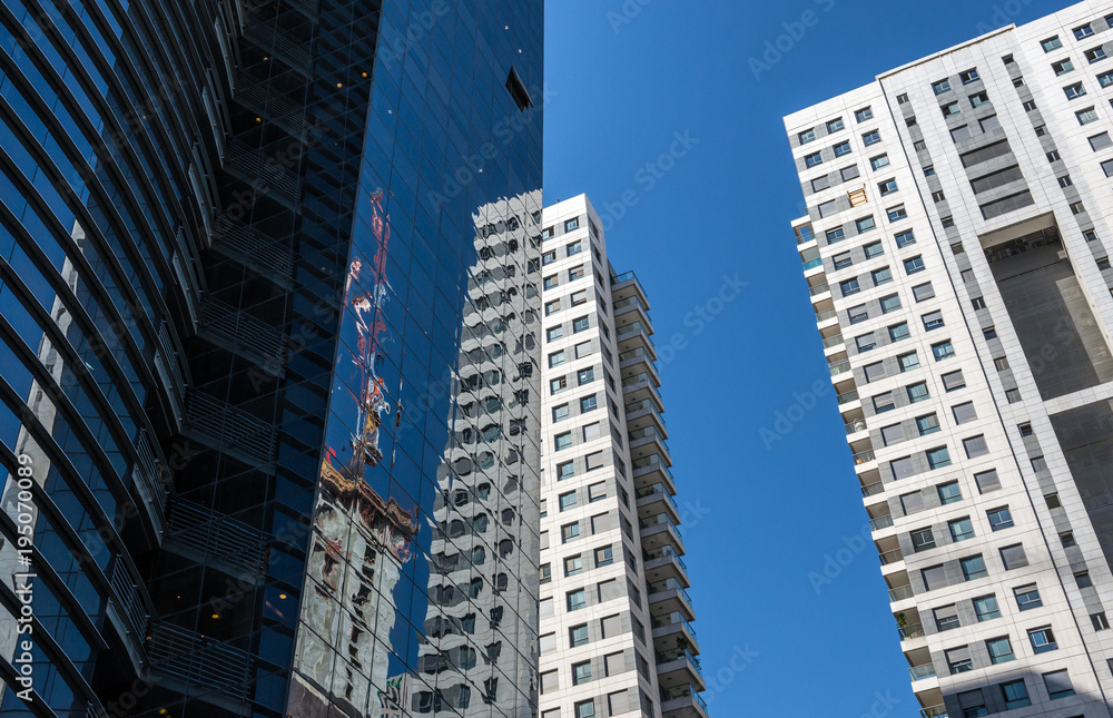 Modern office building and apartment house in Tel Aviv city, Israel