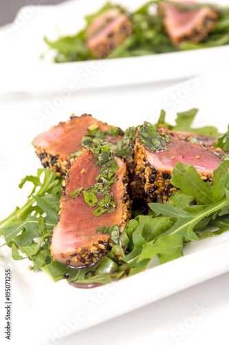 tuna tataki sesame crust appetizer plate photo