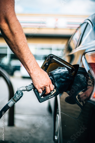 Gas Pump In Car With Hand