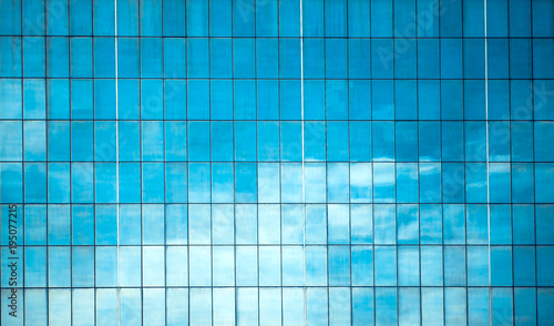 Modern glass windows on the building as background