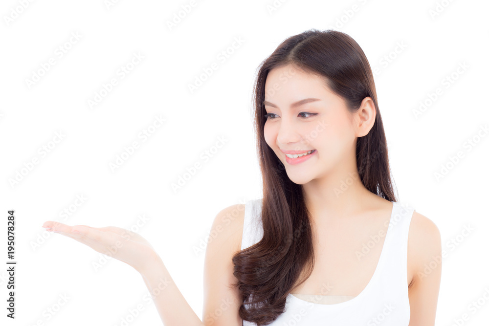 Asian beautiful young woman showing with healthy clean skin presenting something empty copy space on the hand isolated on white background, beauty concept. Asian beautiful young woman showing with healthy clean skin presenting something empty copy space on the hand isolated on white background, beauty concept.