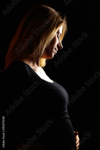 beautiful pregnand women in a low key portrait