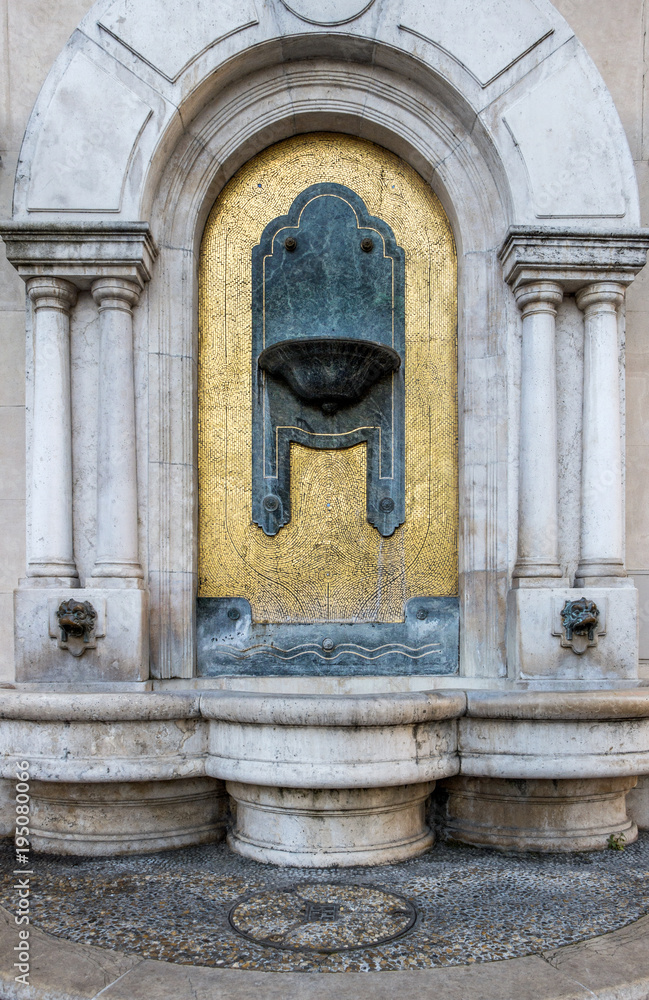 street view of old water fountain in Budapest street view of old water fountain in Budapest