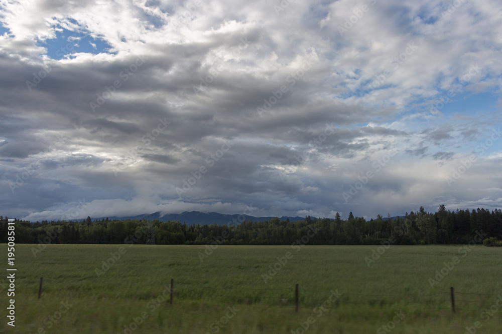 Dramatic storm clouds over mountains Dramatic storm clouds over mountains