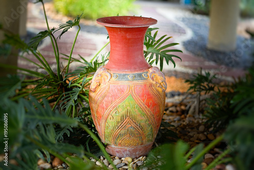 decorative clay vases in garden