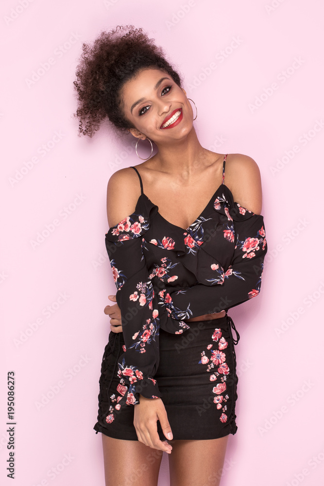 Smiling african american girl posing. Smiling african american girl posing.